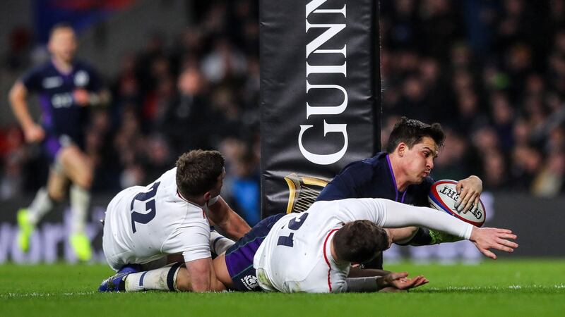 Sam Johnson scores a try to give Scotland the lead in the Six Nations game against Scotland at Twickenham. Photograph:  Ryan Byrne/Inpho