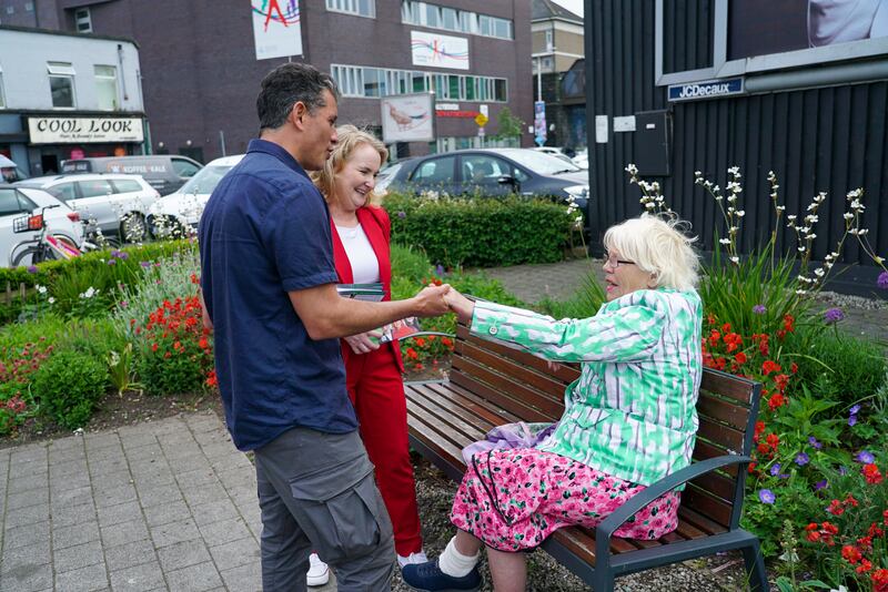 Caio Benício and Fianna Fáil senator Mary Fitzpatrick talk to local resident Joan Keating in the north inner city constituency. Photograph: Enda O'Dowd