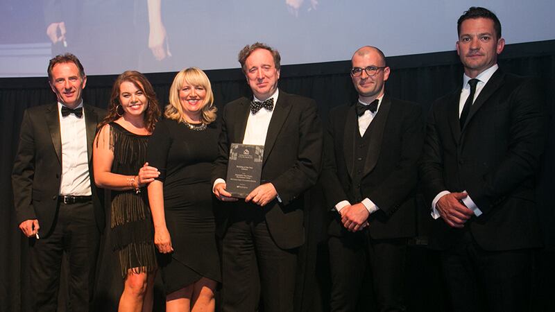 Donal O'Neill, Managing Director, Ardstone presents the Building of the Year – Leisure Award to McCauley Daye O’Connell Architects team.