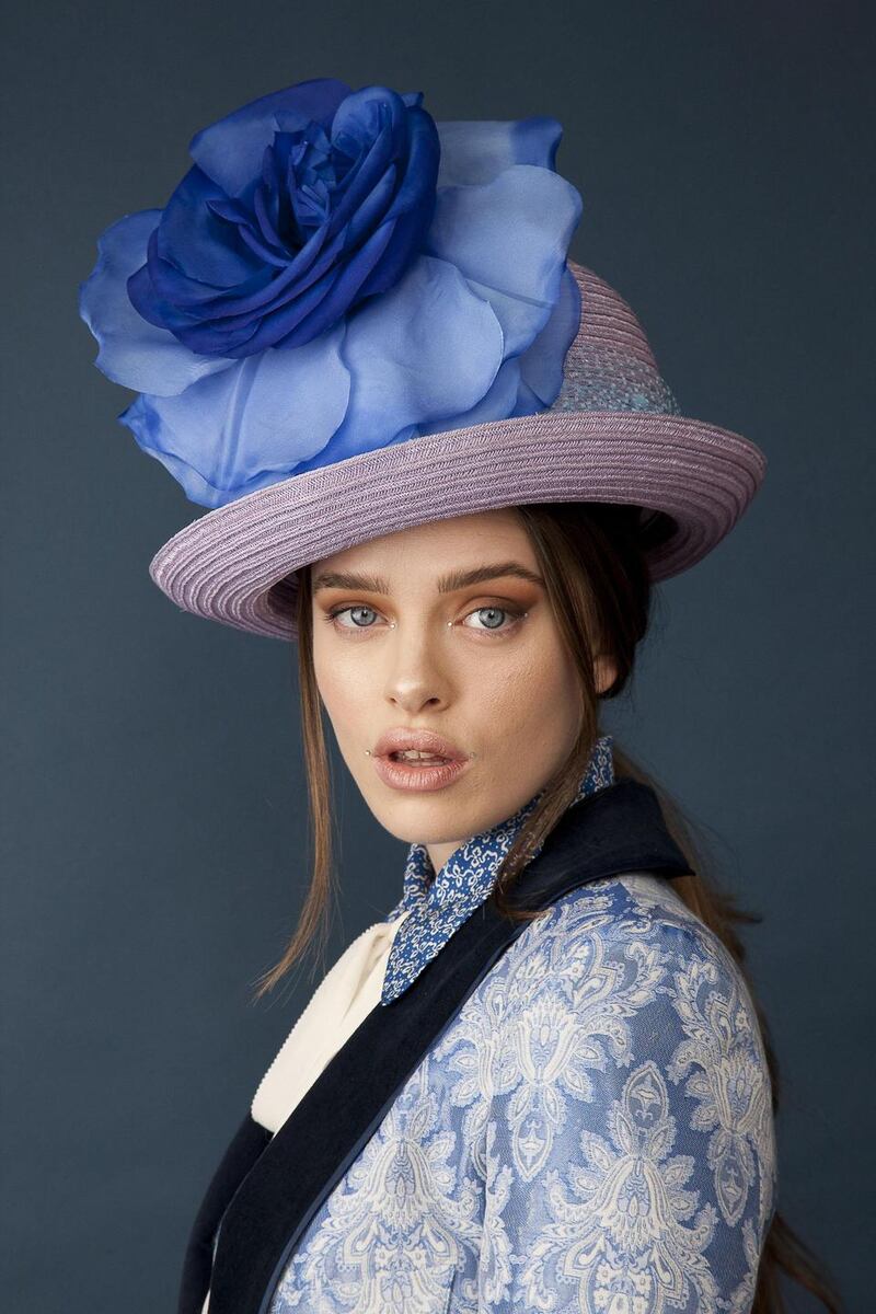 Oversize bowler with silk flower and netting by Anthony Peto €500.  Photograph: Daniel Holfeld
