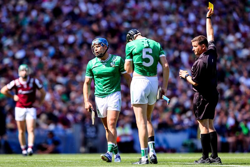 Limerick's Mike Casey is shown a yellow card. Photograph: Tom O’Hanlon/Inpho