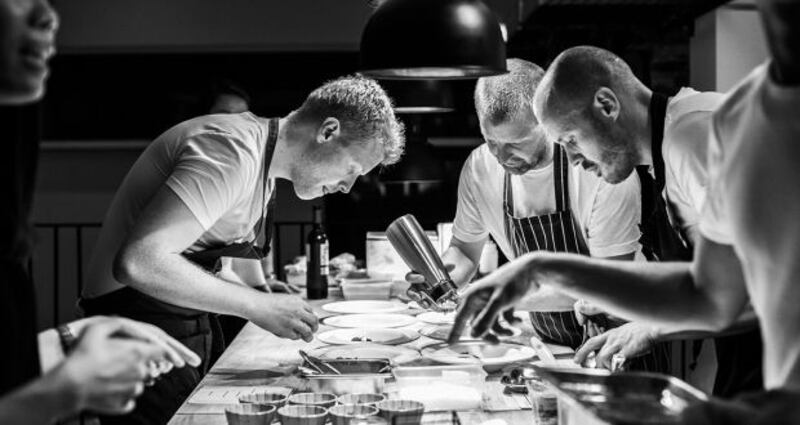 Seven-course tasting menu: Mickael Viljanen (right), with Mark Moriarty (left), also a chef at the Greenhouse, and Graham Neville of Dax restaurant, cooking in Hong Kong in 2018