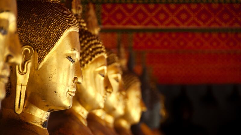 “I was drawn to Buddhist places. We visited the shrines from the guidebook, one with a jade Buddha on a throne, and another with a huge reclining Buddha with scaffolding around his body.”