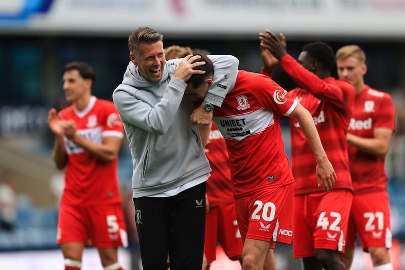 Middlesbrough manager Rob Edwards celebrates his team's win with Finn Azaz, who set up the third goal against Millwall. Photograph: Flynn Duggan/PA Wire