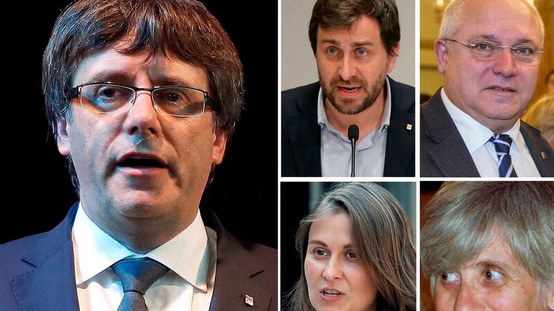 Carles Puigdemont (L) and the four former members of Catalan government who are in hiding:  (top L-R) Antoni Comin, Lluis Puig, Meritxell Serret, and Clara Ponsati. Photograph: EPA