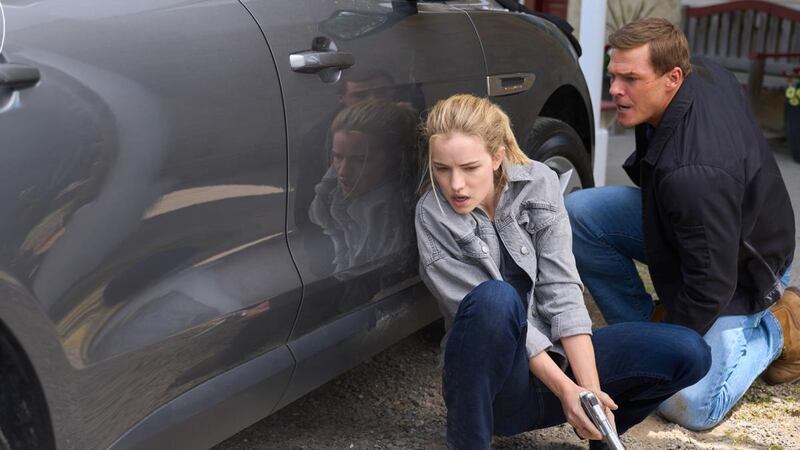 Willa Fitzgerald and Alan Ritchson in Reacher