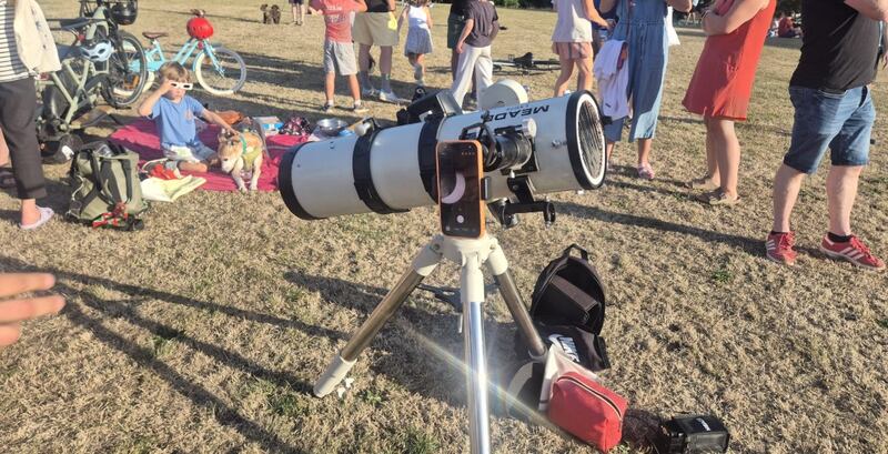 Crowds gathered to watch the eclipse in Eamon Ceannt Park in Crumlin, Dublin. Photo by Claire Murphy