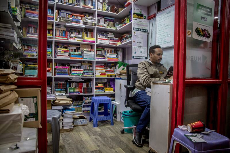 Nuria's manager Abdullah Bulle takes orders in the shop in Nairobi's central business district. Photograph: Sally Hayden