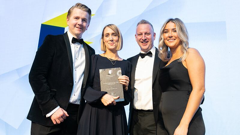 Richard Hemming, preconstruction director, Structure Tone, presents the Fit Out Project of the Year – International award to MOLA team.