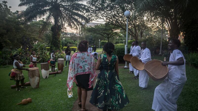 Guests are greeted by local musicians as they arrive at the St Patrick’s Day gala ball in the Sheraton Hotel in Kampala. Photograph: Sally Hayden