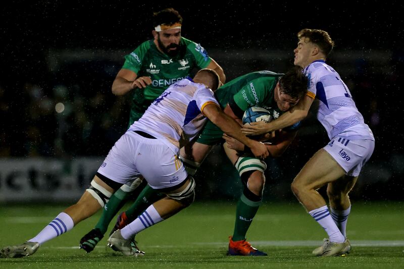 Connacht's Gavin Thornbury is tackled by Ross Molony and Rob Russell of Leinster during the BKT United Rugby Championship at the Sportsground in Galway. Photograph: Ben Brady/Inpho