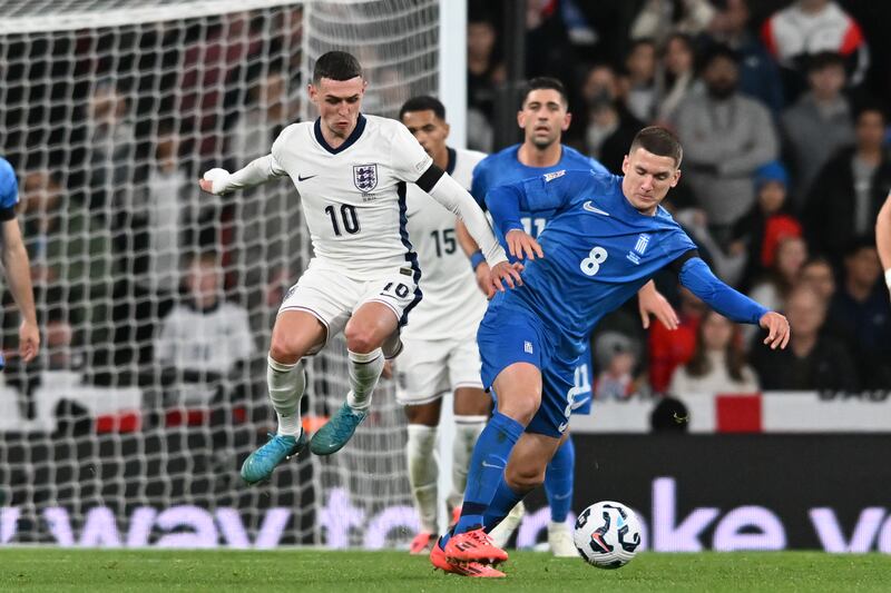England's Phil Foden challengiing Christos Tzolis  of Greece. Photograph: MI News/NurPhoto via Getty Images