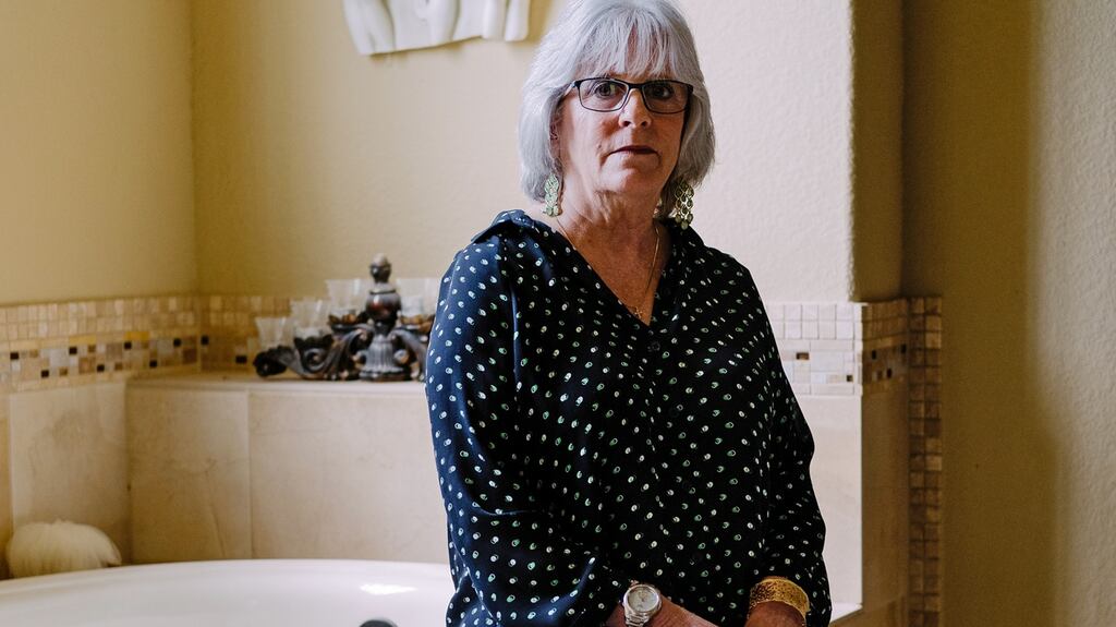 Deborah Huffman  in the bathroom of her home, where she worked up  the nerve to show her husband her back, and tell him about her skin-picking disorder. Photograph: Christopher Lee/ The New York Times