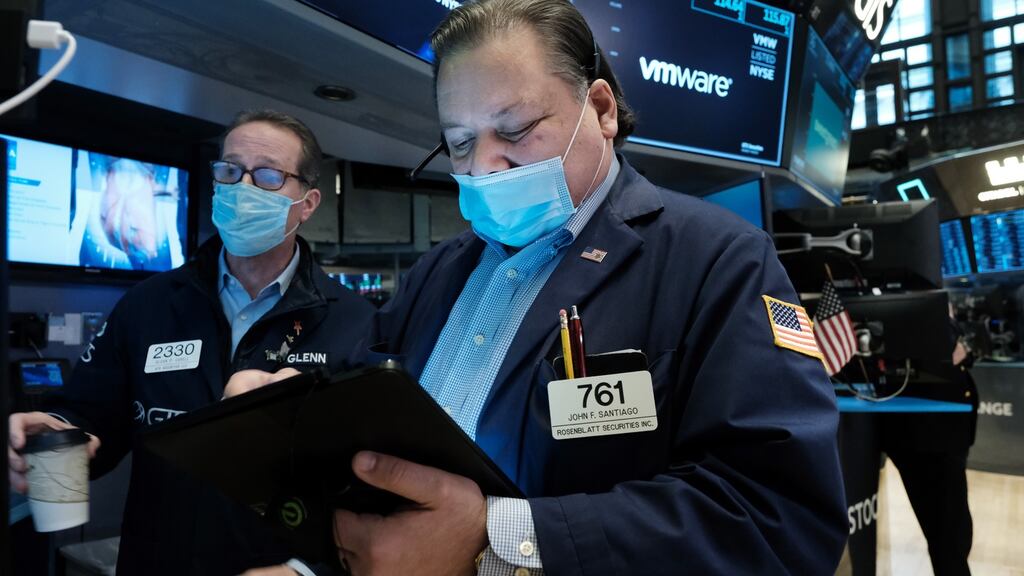 Gains in financial and healthcare shares bolstered the Dow and the S&P 500 index on Monday, as investors pinned their hopes on Russia-Ukraine peace talks
