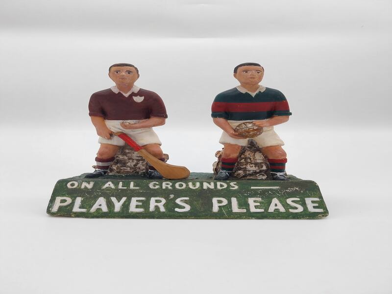 A Player's Tobacco sign with GAA and hurling players in the Victor Mee sale