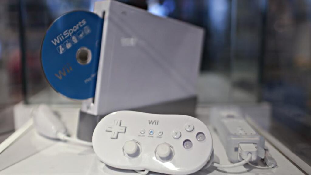 A Nintendo Wii game console sits on display. The company said it would appeal a decision by the a UK court that it violated two patents for recognising hand gestures and motion on the Wii. Photographer: Daniel Acker/Bloomberg News