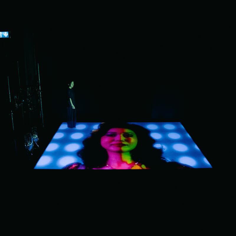 The Madonna of Asia: Mai Ishikawa and (in the projection) Kaai in Choy-Ping Ní Chléirigh-Ng’s play. Photograph: Aiesha Wong