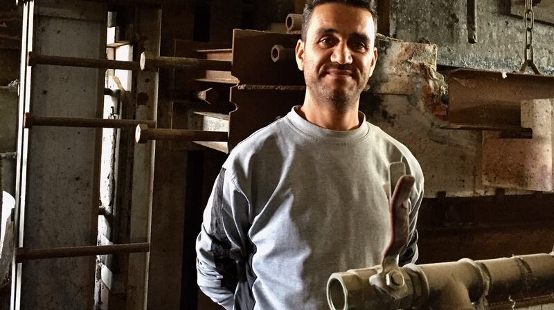 Aleppo regeneration: Mahmoud Hallaq in the glass factory. Photograph: Michael Jansen