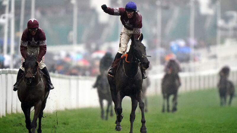 Delta Work ridden by Jack Kennedy (centre) passes Tiger Roll ridden by Davy Russell (left) to win the Glenfarclas Chase. Photograph:  Tim Goode/PA Wire