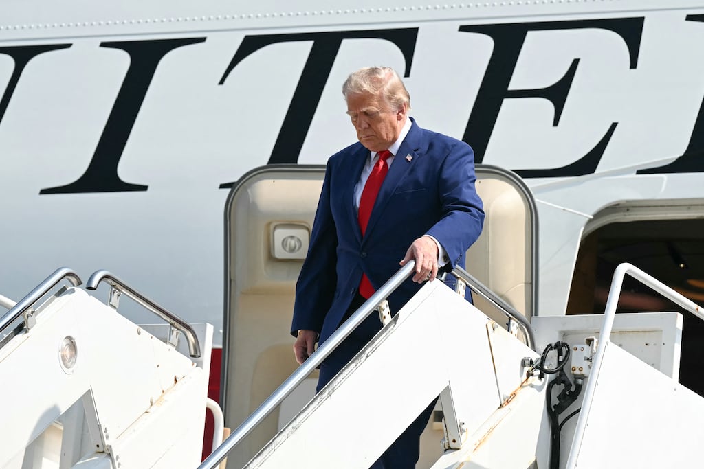 US president Donald Trump steps off Air Force One at Dover Air Force Base in Dover, Delaware, to attend a dignified transfer event for US service members killed during operations in the Middle East. Photograph: Saul Loeb/AFP via Getty Images