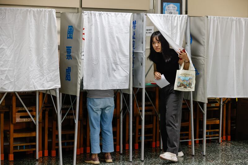 Taiwanese residents cast their vote during a recall election in Taipei, Taiwan, in July. Photograph: Ritchie B Tongo/EPA