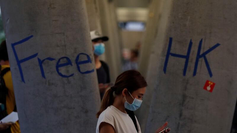 A woman attends a protest following a day of violence over a proposed extradition Bill,  in Hong Kong, on Thursday. Photograph: Jorge Silva/Reuters