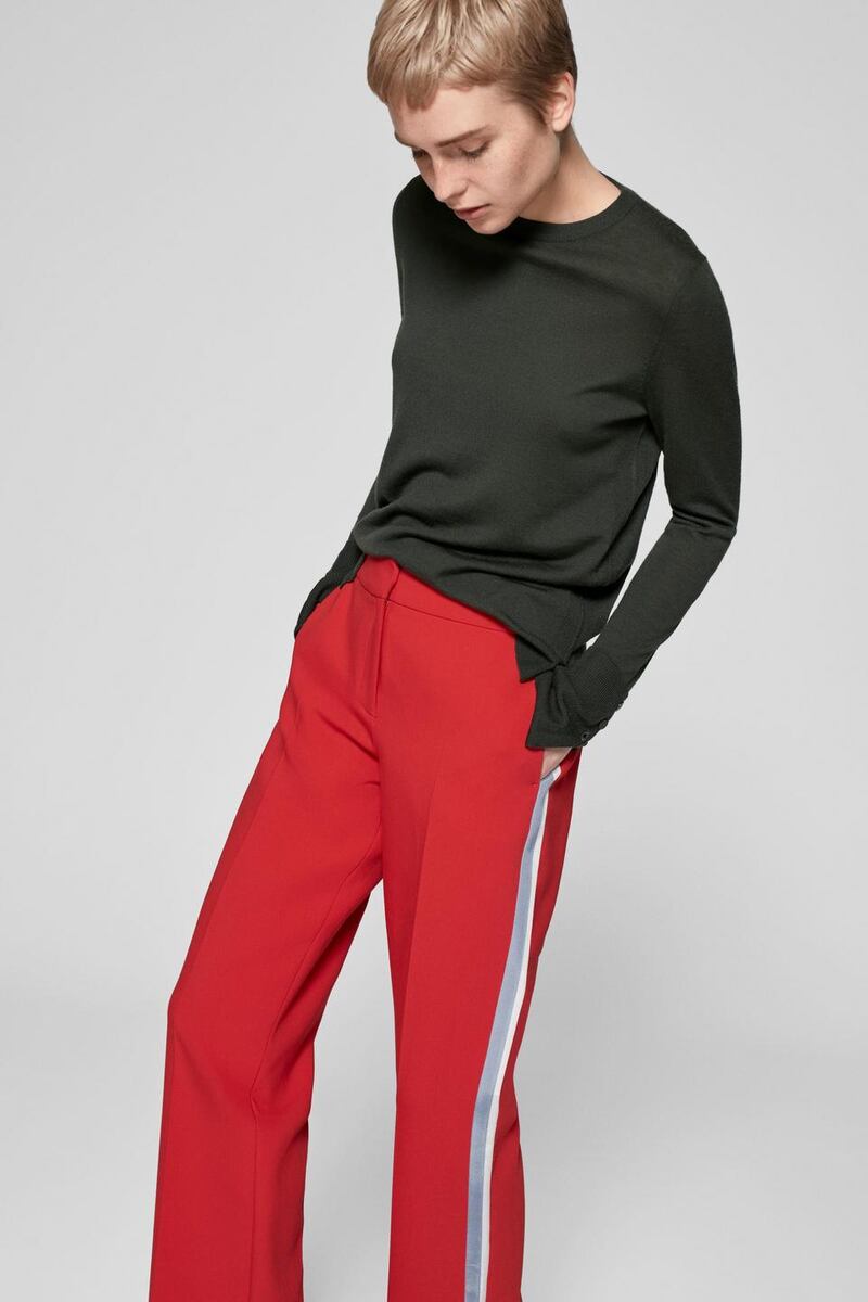 Me+Em has released red “man pants”  with go-faster stripes in pale blue and white for €192