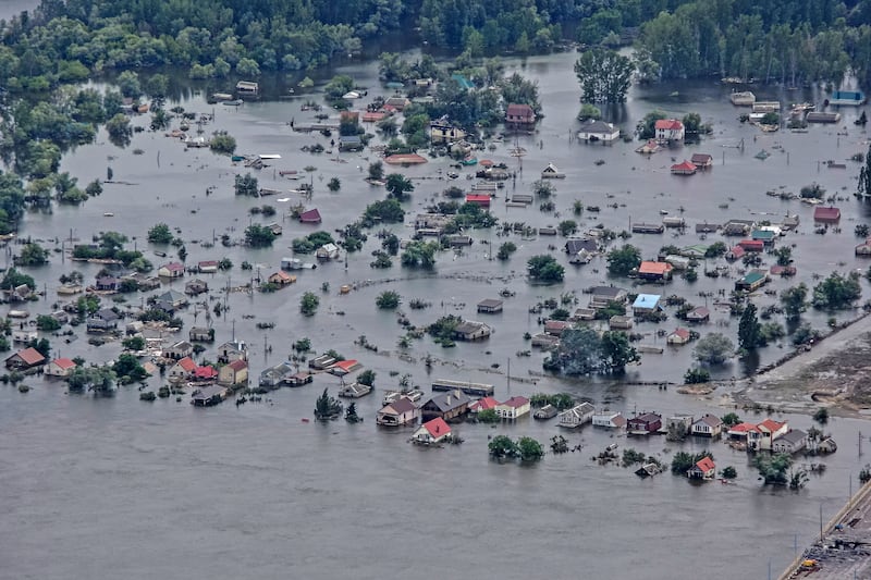 Flood waters from the destruction of the Kakhovka dam in June 2023. Photograph: Daniel Berehulak/The New York Times