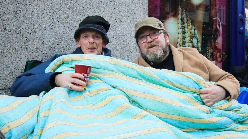 Vincent Kearns (left),  from Rathfarnham, and   Dave Griffith, from Terenure, who both queued a  long time this month to secure tickets  for U2 in Dublin this summer. File photograph: Gareth Chaney/Collins