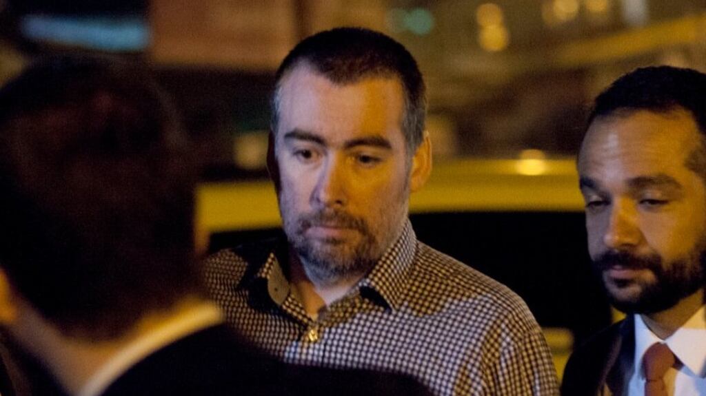 Irish man Kevin Mallon (centre, check shirt) with members of his legal team following his release from the Bangú 10 prison in the western suburbs of Rio on Saturday night. Photograph: Phil Clarke Hill/The Irish Times
