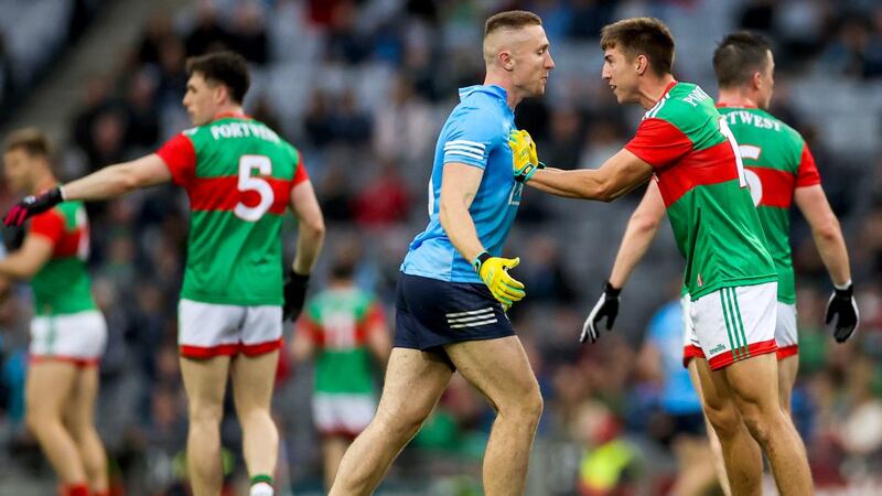 Enda Hession gets to grips with Paddy Small. In terms of pure size, Mayo have the edge on Tyrone. Photograph: James Crombie/Inpho