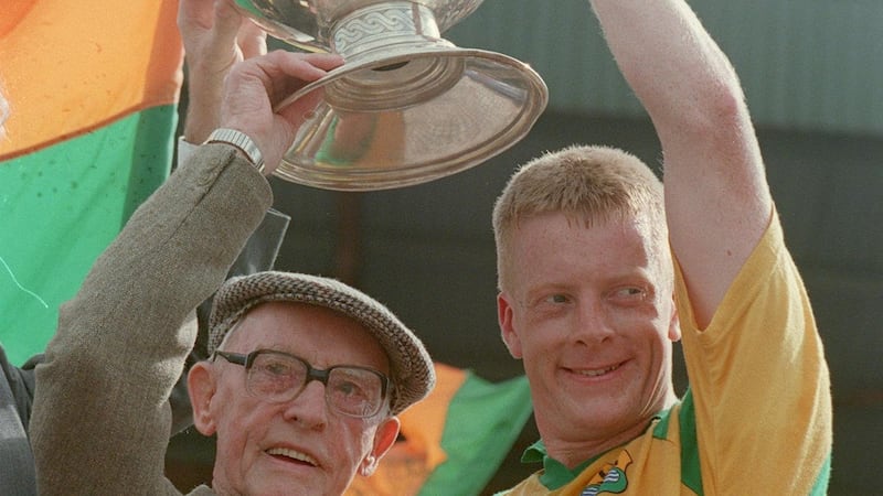 Declan Darcy lifts the Connacht title in 1994 alongside  95-year-old Tom Gannon in Hyde Park. Gannon was the only other man to captain Leitrim  to the title in 1927. Photograph: Tom Honan/Inpho