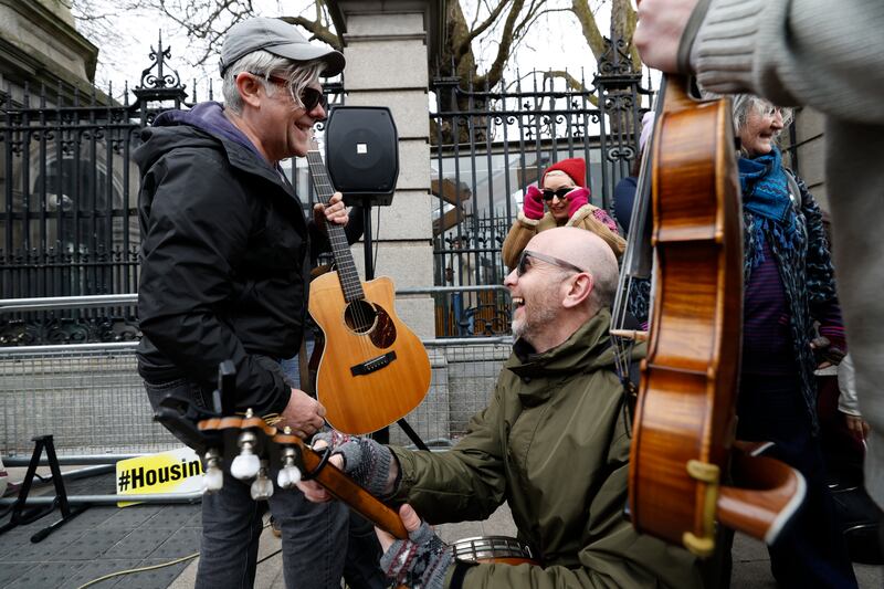 Cork-based musician Martin Leahy marks the 200th and final protest of his weekly housing crisis protest outside Leinster Houe with speeches from activists, politicians and a performance of Everyone Should Have a Home.  Photograph Nick Bradshaw/The Irish Times