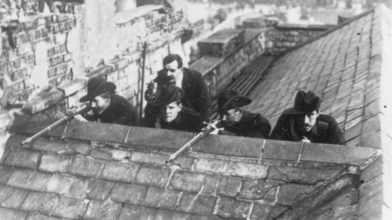 Revolutionary aim: Irish Citizen Army soldiers on the roof of Liberty Hall in Dublin just after the 1916 Rising, for many a key moment in securing the independence of Ireland and the eventual establishment of a republic. Photograph: Robert Hunt/Windmill Books/UIG via Getty