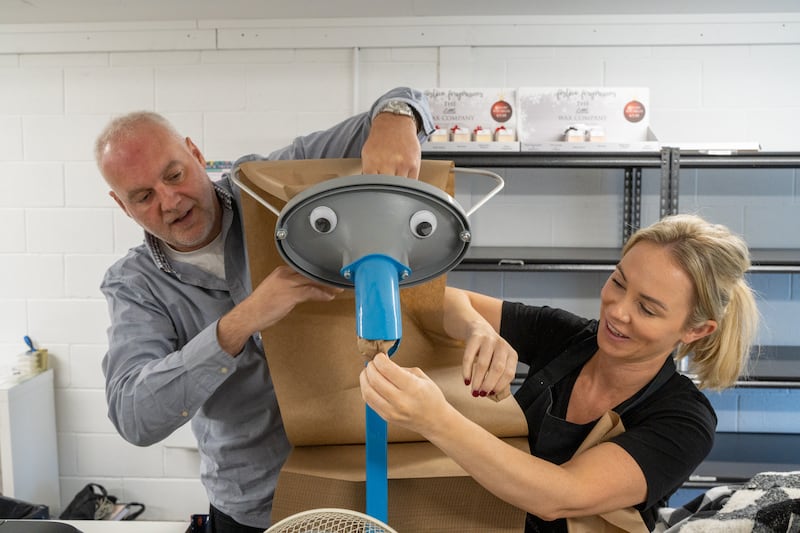 The couple working one of its new leaner packaging machines