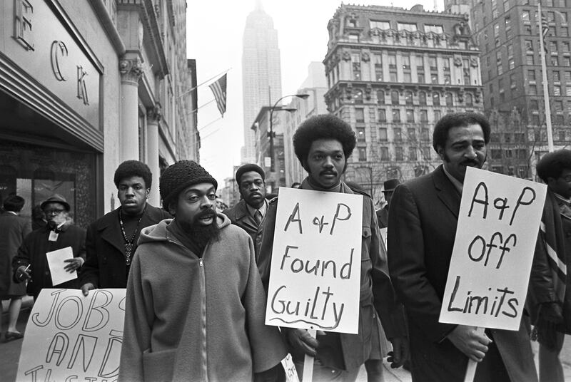 Jesse Jackson (centre) marches with the writer and activist Amiri Baraka (left) and William A Jones (right) during a boycott of the A&P supermarket chain, December 16th, 1970. Photograph: Neal Boenzi/The New York Times