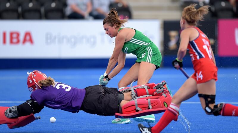 Ireland’s Deirdre Duke  scores past USA goalkeeper Jackie Briggs during the Women’s World Cup Pool B game at Lee Valley Stadium in London. Photograph: Joe Toth/Inpho