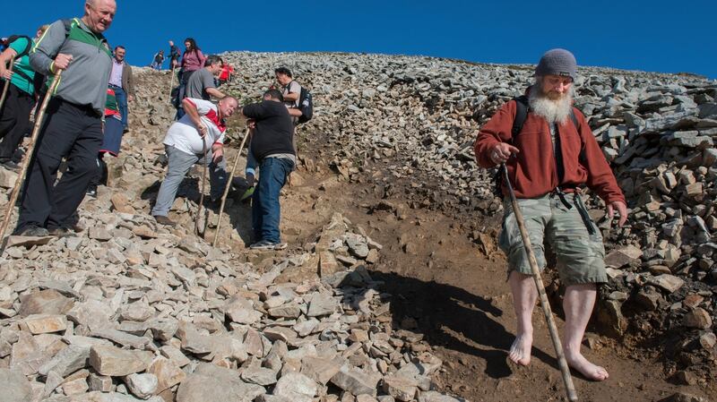 Annual Croagh Patrick pilgrimage in  Co Mayo: Barefoot pilgrim John Toner, from Kinlough, Co Leitrim. Photograph: Michael McLaughlin