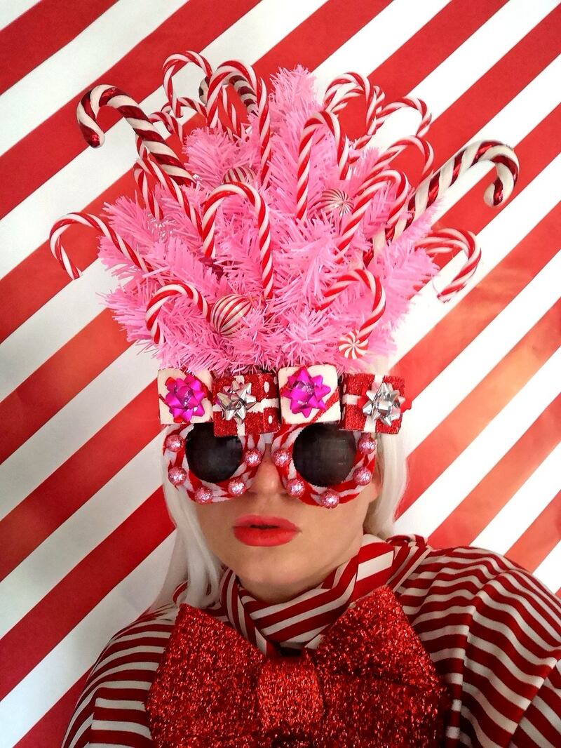 Candy Cane – always screams festive joy. The centrepiece is made from a miniature tree and decorated with candy canes and satin baubles from the 1980s which I sourced on eBay. The frames are customised using pipe cleaners and mini glitter balls