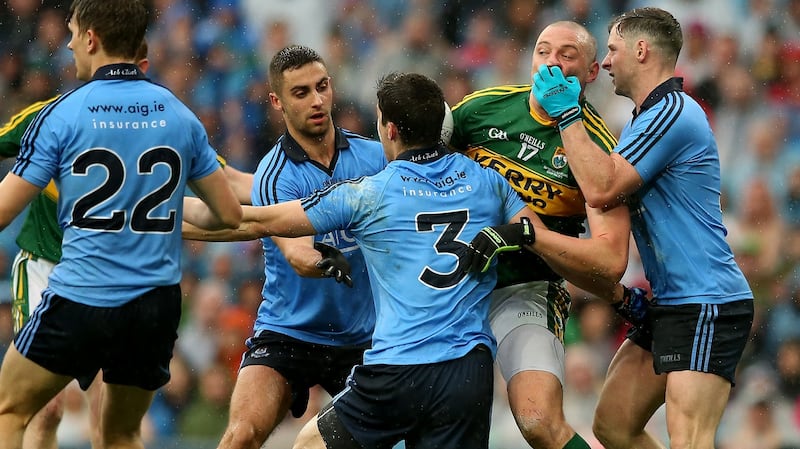 James McCarthy, Rory O’Carroll and Philly McMahon tackle Kieran Donaghy during the 2015 final. Photo: James Crombie/Inpho