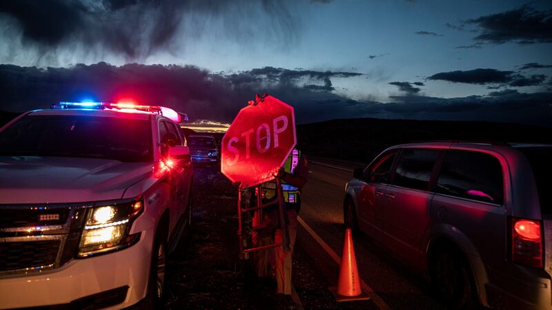 Navajo police officers set up a road block in Window Rock, Arizona,  in response to the coronavirus pandemic. Photograph: Adriana Zehbrauskas/New York Times