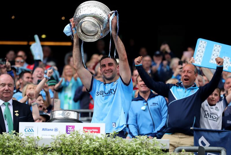 Dublin's James McCarthy lifts The Delaney Cup. Photograph: Bryan Keane/Inpho