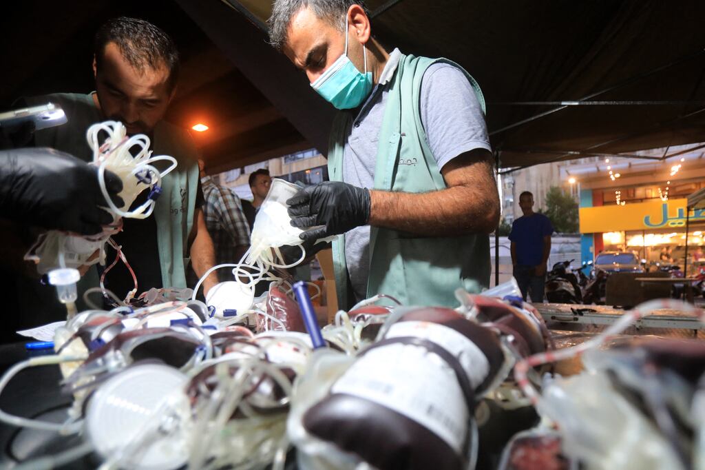 Medics collect blood donations in Beirut after after hundreds of pagers used by Hizbullah members exploded across Lebanon on Tuesday. Photograph: AFP via Getty Images