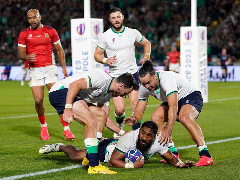 Ireland's Bundee Aki scores his side's sixth try against Tonga. Photograph: Andrew Matthews/PA
