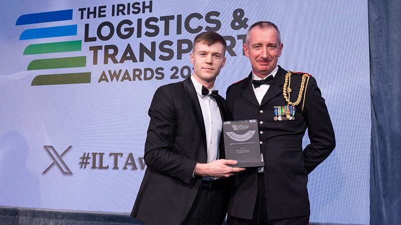 Eduard Tampu, senior recruitment consultant at Driving Force, presents the logistics & transport team of the year to Colonel Gareth Prendergast, Irish Defence Forces.