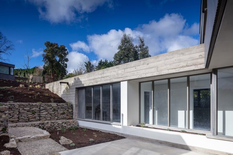 The property has a landscaped garden to the rear