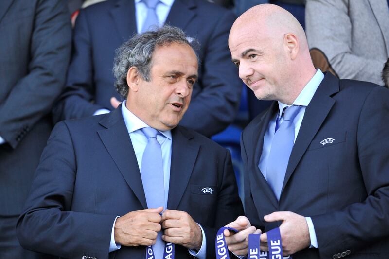 Michel Platini and Gianni Infantino talk at the 2015 UEFA Youth League final between Shakhtar Donetsk and Chelsea. Photograph: Harold Cunningham/Getty