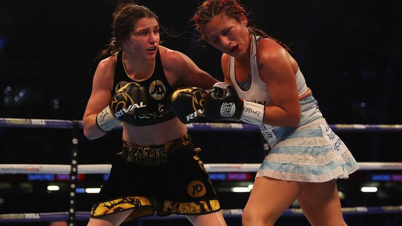 Taylor catches Anahi Sanchez with a left hook. Photo: Richard Heathcote/Getty Images