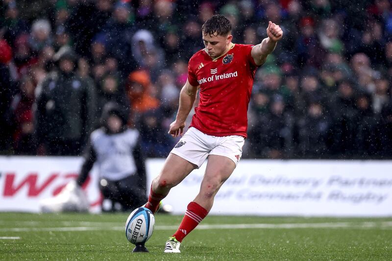 Munster's Tony Butler takes a kick. Photograph: Ben Brady/Inpho