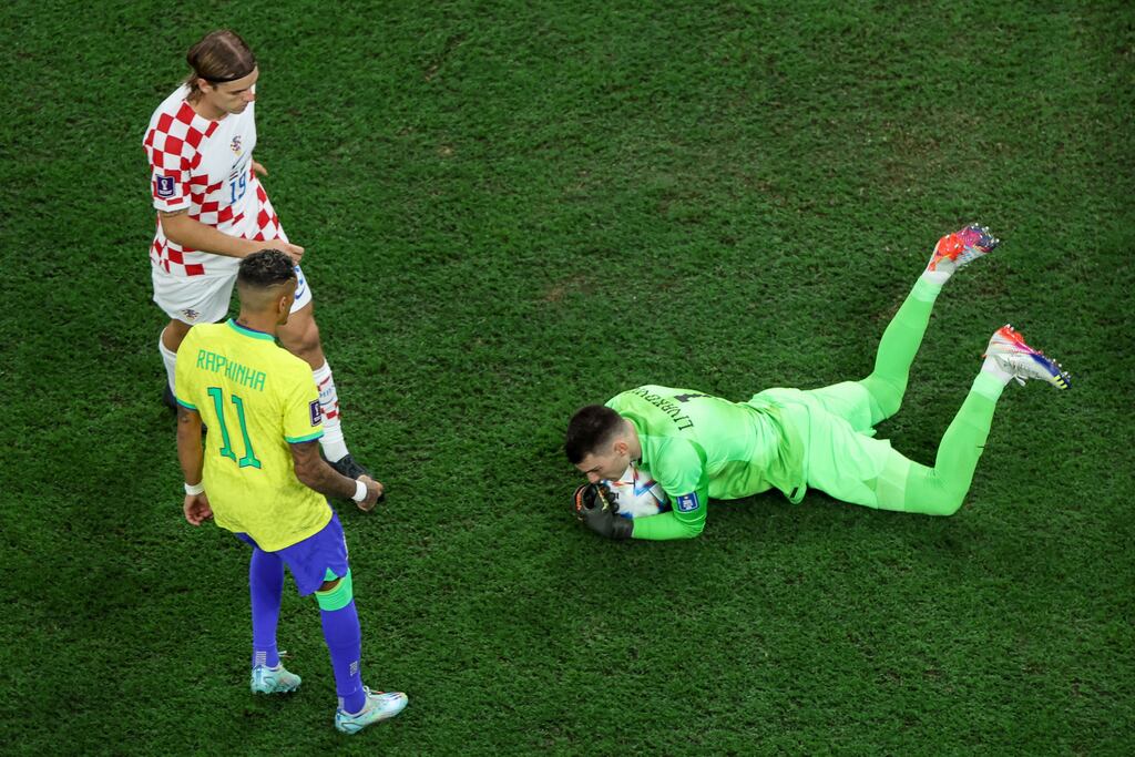 Croatia's goalkeeper Dominik Livakovic secures the ball in the quarter-final against Brazil. Photograph: Giuseppe Cacace/AFP via Getty Images